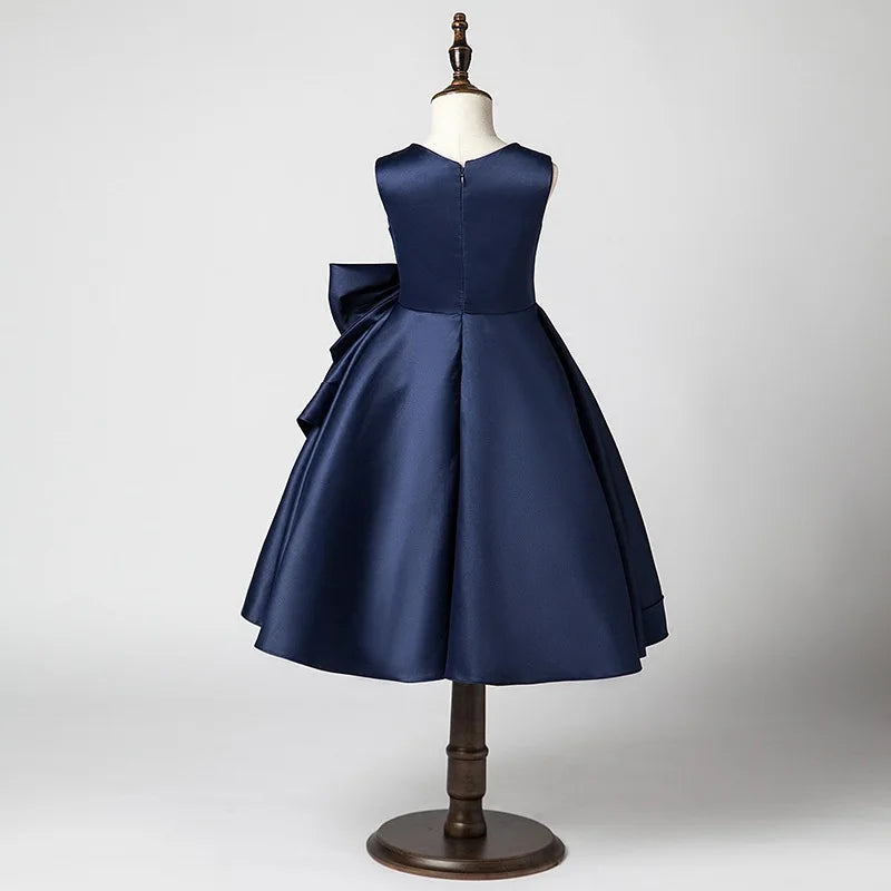 Navy blue dress on a mannequin against a light gray background